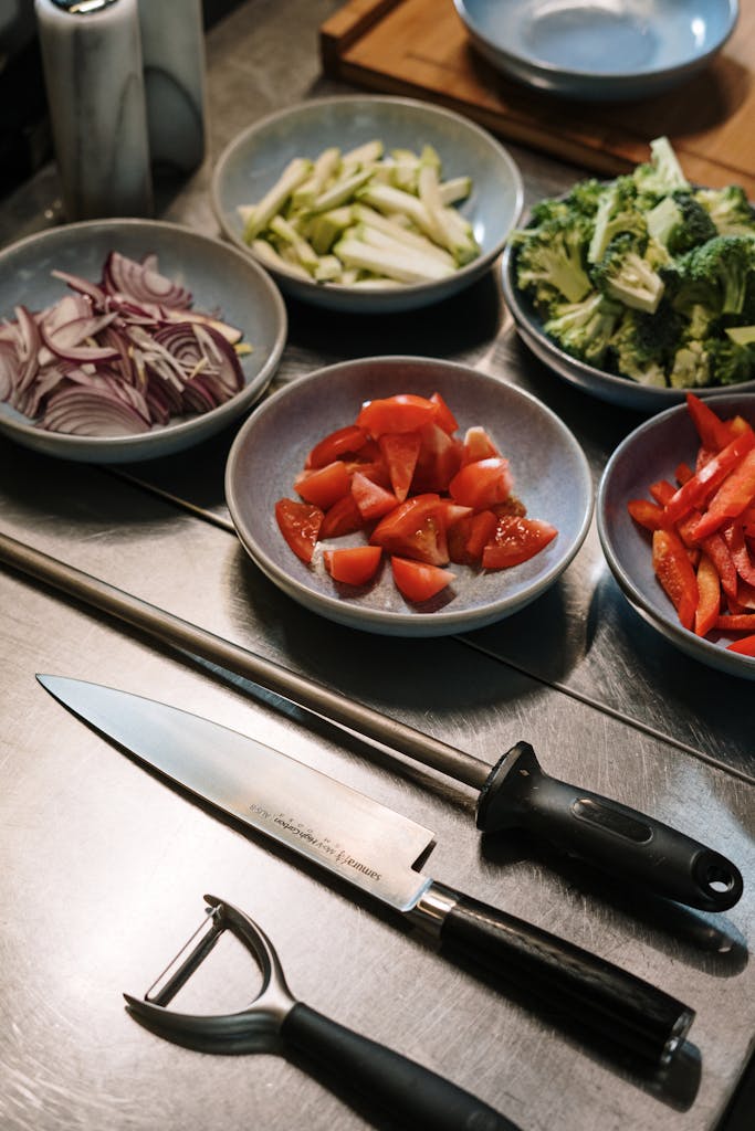 Contact Us 1 Sliced Tomato and Green Vegetable on White Ceramic Bowl
